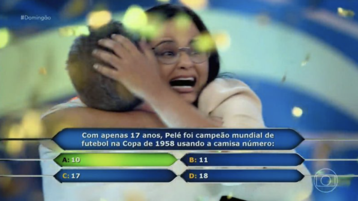 Jullie é a primeira ganhadora do 'Quem Quer Ser um Milionário' - Reprodução/TV Globo