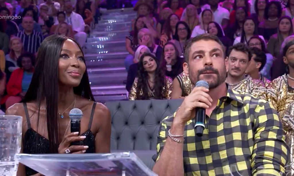 Naomi Campbell reencontra Cauã Reymond no Domingão com Huck e revela passado inusitado Naomi Campbell reencontra Cauã Reymond no Domingão com Huck e revela passado inusitado - Foto: GloboPlay